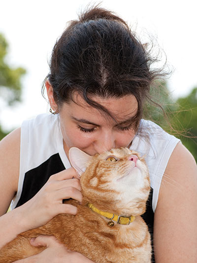 Perks of cat adoption - a loving cat receives "luvins"